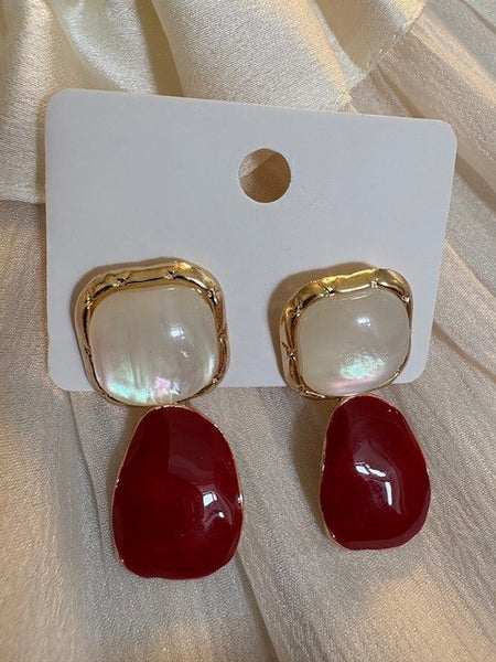 White, red and gold statement earrings