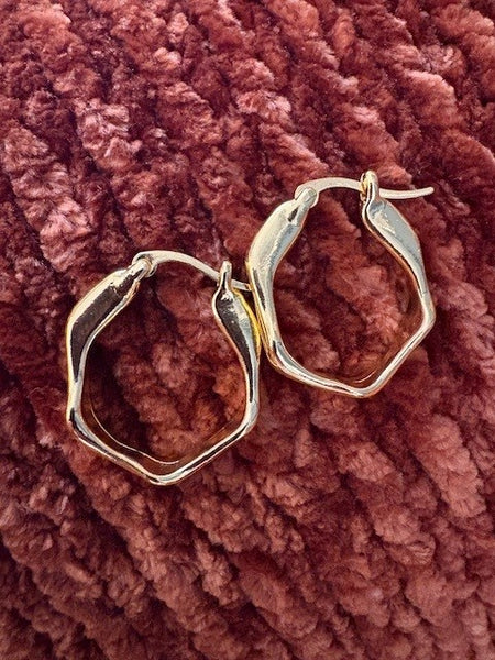 Golden twist style hoop earrings